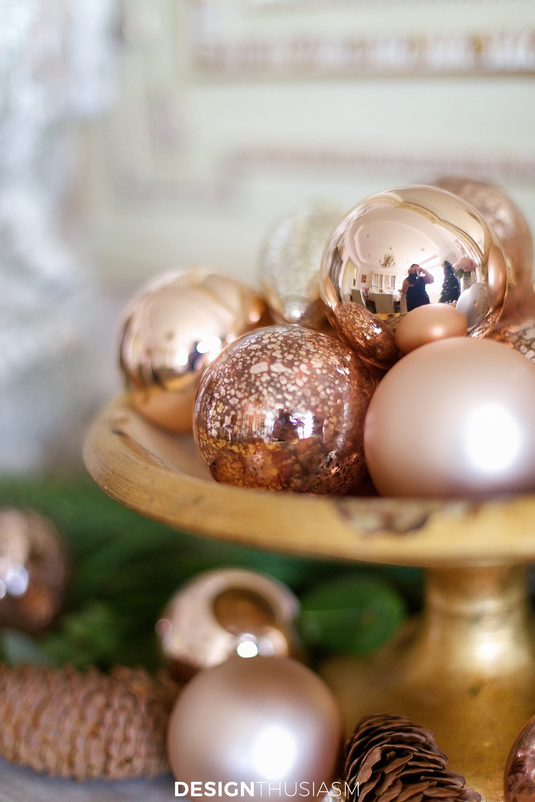 Close-Up of Rose Gold and Gold Ornaments on a Cake Stand — Gold Christmas Decor