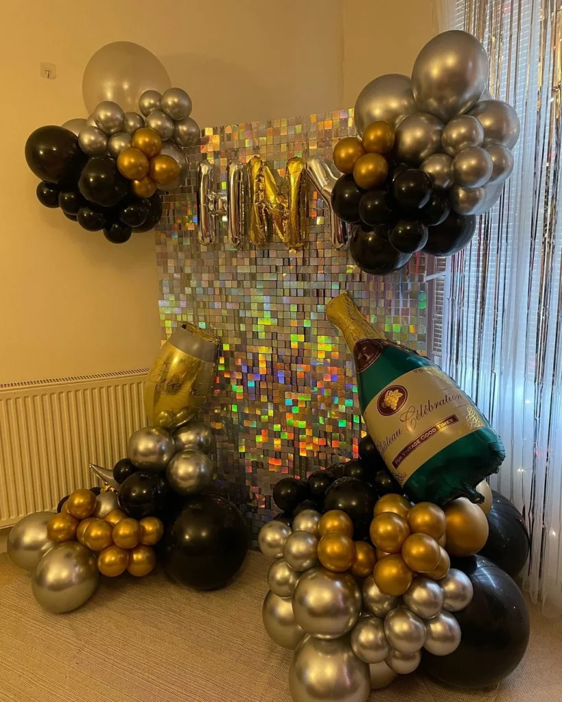 Shimmering Sequin Wall with Champagne Bottle Balloons — New Years Eve Backdrop