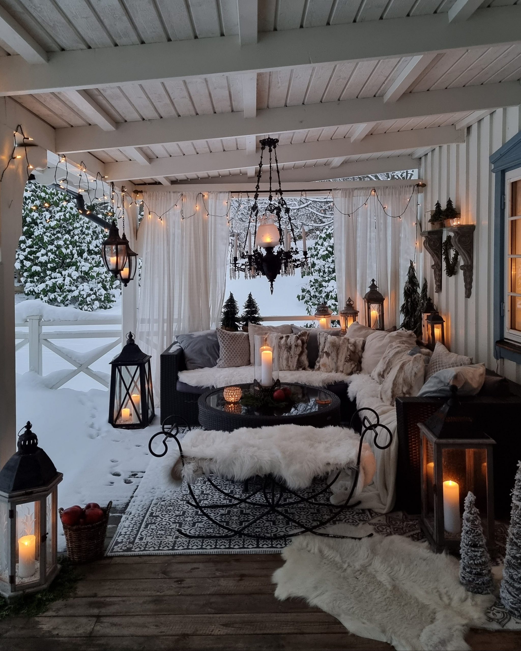 Farmhouse Porch Seating Area with Abundant Cozy Textiles Farmhouse Porch Seating Area with Abundant Cozy Textiles — Winter Porch Decor